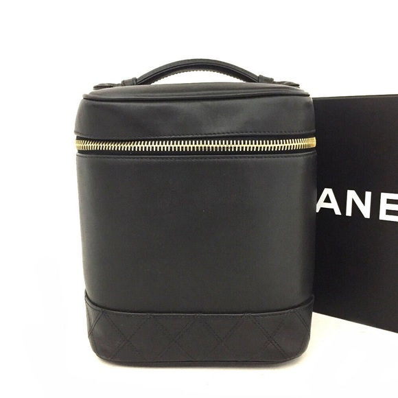 CHANEL Handbags - CHANEL Quilted CC Logo Lambskin Cosmetic Vanity